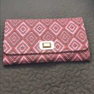 Pink geometric crossbody/clutch.